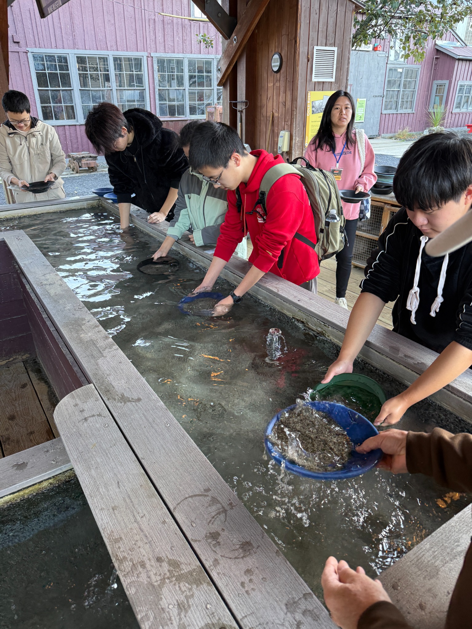 Hands-on discovery at the gold-panning troughs.